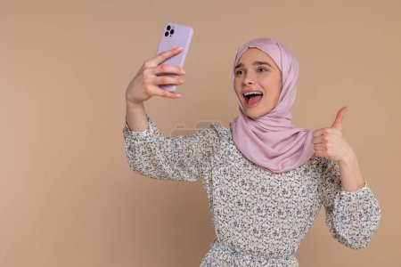 Photo for Selfie. Happy young woman making selfie and smiling - Royalty Free Image
