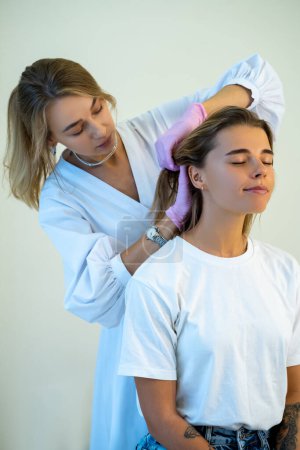 Photo for Bio revitalization of hair skin, doctor cosmetologist making injection, beautician and patient in clinic of aesthetic medicine - Royalty Free Image