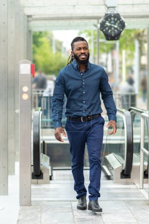 Photo for Confident man. Young dark-skinned tall man in denim clothes looking confident - Royalty Free Image