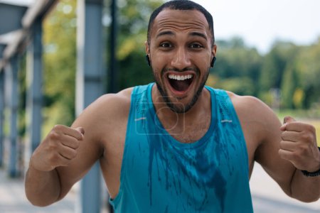 Photo for Excited. Handsome young african american sportsman feeling excited - Royalty Free Image