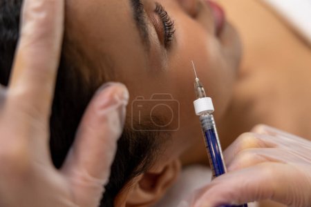Photo for Beauty injections. Close up of female face and hands with syringe - Royalty Free Image
