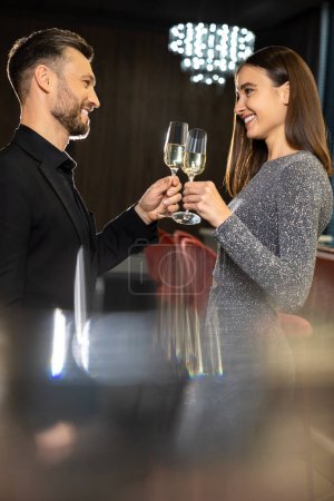 Photo for Business party. Young man and young woman on a business party feeling excited - Royalty Free Image