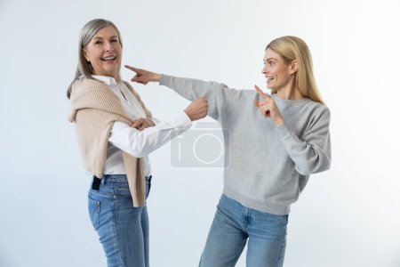 Photo for Good mood. Mom and daughter feeling great and dancing together - Royalty Free Image