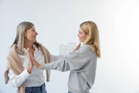 Photo for Good mood. Mom and daughter feeling great and dancing together - Royalty Free Image