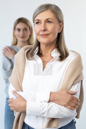Photo for Women. Good-looking mature well-groomed woman with her daughter - Royalty Free Image