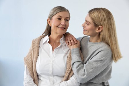 Photo for Feeling good. Mother and daughter looking contented and feeling good together - Royalty Free Image