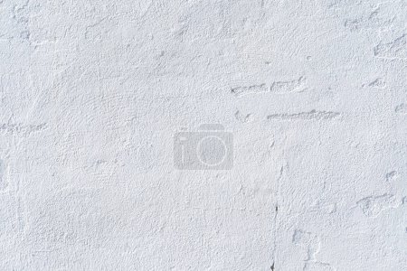Téléchargez les photos : Texture white painted cement wall with blemishes and cracks. Clean background. - en image libre de droit
