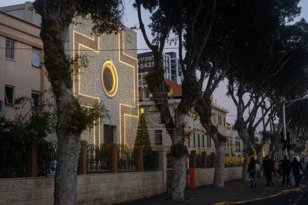 Photo for Haifa, Israel - December 12, 2022: View of the Catholic St. Josephs Church, with Christmas decorations, in downtown Haifa, Israel - Royalty Free Image
