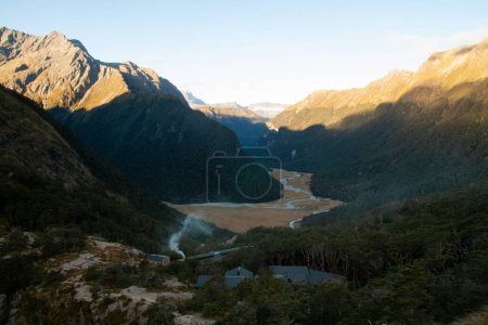 Photo for Routeburn Flats Hut and mountain valley at Routeburn Track,  New Zealand - Royalty Free Image