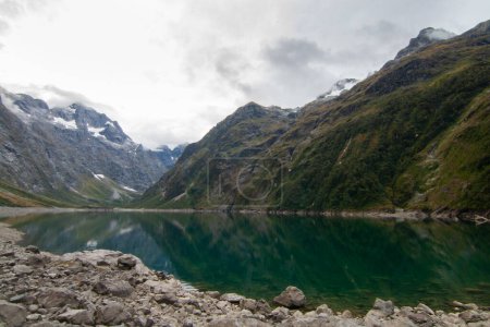 Photo for Lake Marian alpine lake in Fiordland New Zealand, Southern Alps - Royalty Free Image