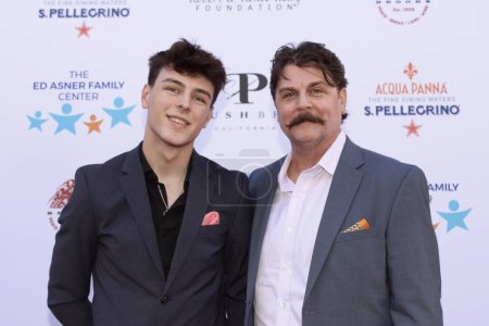 Photo for Studio City, CA - June 15, 2024: Johnny Dowers and Elijah Dowers attend the Ed Asner Celebrity Poker to Benefit Autism research. - Royalty Free Image