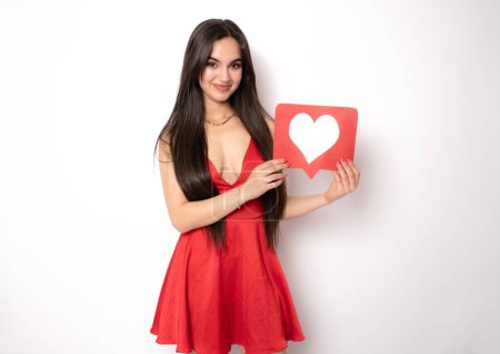 Foto de Cute girl holding paper hearts, st.Valentines day concept - Imagen libre de derechos