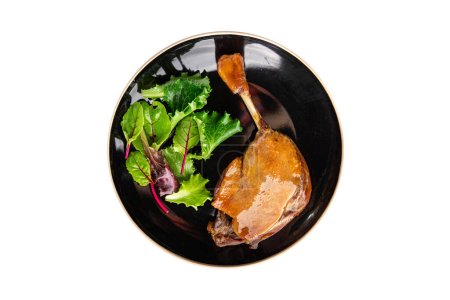 Entenconfit Fleischkeule, Rote-Beeren-Sauce Essen Snack auf dem Tisch kopieren Weltraum Lebensmittel Hintergrund 