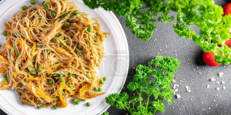 Photo for Rice noodles vegetable Asian dish fresh funchose meal food snack on the table copy space food background rustic top view - Royalty Free Image