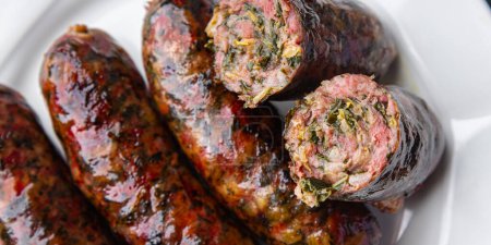 sausage meat green herb fresh ground pork, beef meal food snack on the table copy space food background rustic top view