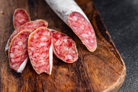 Photo for Fuet sausage cured spanish meat product meal food snack on the table copy space food background rustic top view - Royalty Free Image