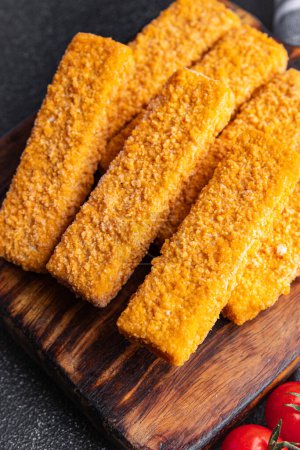 fish stick deep-fried seafood breadcrumbs fast food meal food snack on the table copy space food background rustic top view