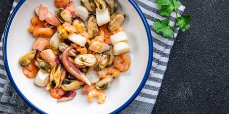 Photo for Seafood salad shrimp, mussel, scallop, octopus healthy meal food snack on the table copy space food background rustic top view pescatarian diet - Royalty Free Image