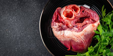 Photo for Meat heart raw offal pork or beef meal food snack on the table copy space food background rustic top view - Royalty Free Image