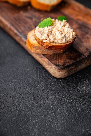 Photo for Rillettes crab sandwich smorrebrod seafood aperitif food meal food snack on the table copy space food background rustic top view - Royalty Free Image