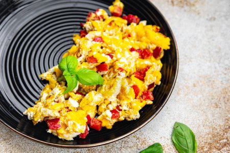 scramble eggs pepper paprika healthy meal food snack on the table copy space food background rustic top view