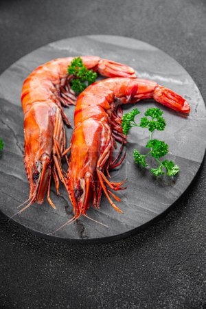 Photo for Langoustine large shrimp gambas prawn eating cooking appetizer meal food snack on the table copy space food background rustic top view - Royalty Free Image