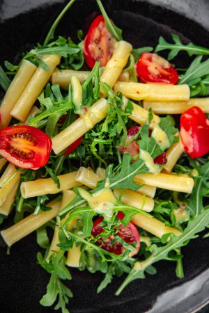pasta salad tomato, arugula, pasta fresh food tasty eating meal food snack on the table copy space food background 