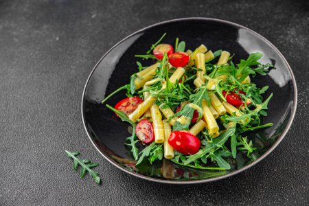 pasta salad tomato, arugula, pasta fresh food tasty eating meal food snack on the table copy space food background 