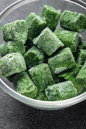 spinach frozen cube semifinished fresh food tasty healthy eating cooking meal on the table copy space food background