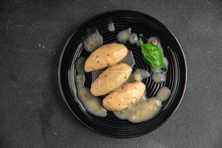 quenelles meat pork mushroom sauce eating cooking appetizer meal food snack on the table copy space food background rustic top view