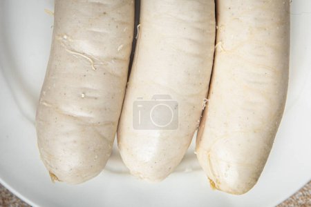 meat white sausage weisswurst bavarian sausages cooking appetizer meal food snack on the table copy space food background rustic top view