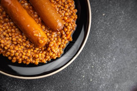 lentils with sausages fresh meal food snack on the table copy space food background rustic top view