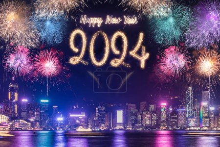 Happy new year 2024 firework over cityscape building near sea at night time celebration-stock-photo