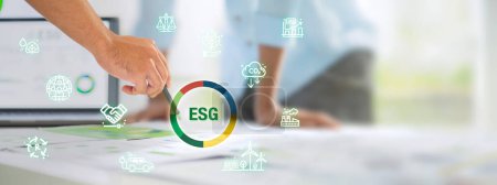 Téléchargez les photos : Close up team brainstorming on ESG sustainable business (environment, social, governance) for sdgs goals in green office - en image libre de droit