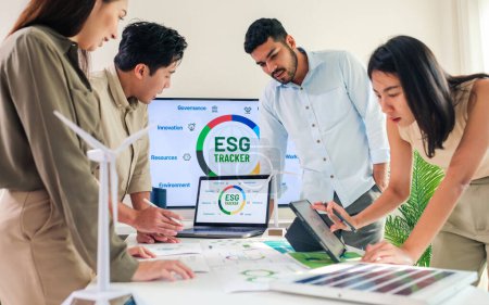 diversity team brainstorming focused on ESG (environment,social,governance)  for sdgs goals in a sustainable green office