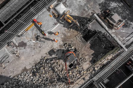 Photo for Aerial drone photo of demolition site and construction workers using heavy machinery - Royalty Free Image