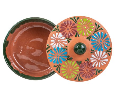 Foto de Tortilla pan with red clay lid made in Mexico. Traditional handmade Mexican clay crockery. isolated White background. - Imagen libre de derechos