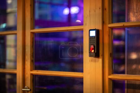 Photo for Digital electronic lock opening with fingerprint. Modern keyless device using personal biometric data identification for access. Smart wireless system used in private houses, banks, hotels, offices - Royalty Free Image