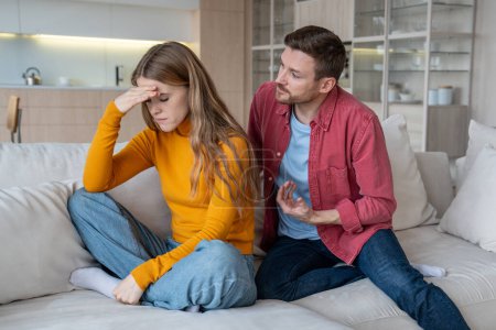 Photo for Family couple engages in heated relationship discussion, woman refuses to listen, reflecting tension, communication challenges in partnership. Conflict misunderstand emotional problem, marital discord - Royalty Free Image