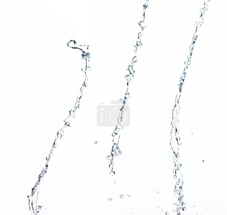 Photo for Shape form droplet of Water splashes into drop water line tube attack fluttering in air and stop motion freeze shot. Splash Water for texture graphic resource elements, White background isolated - Royalty Free Image