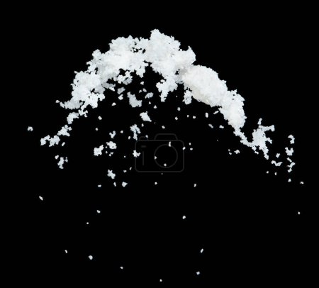 Photo for Salt flying explosion, crystal white grain salts explode abstract cloud fly. Beautiful complete seed salt splash in air, food object design. Selective focus freeze shot black background isolated - Royalty Free Image