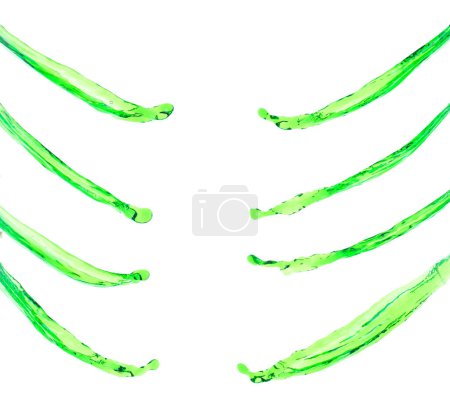 Photo for Green juice from nature splash in Air. Water green leaf pour from sky and purify clean natural. Many shape form of water splashing flow over White background Isolated. - Royalty Free Image
