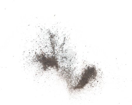Photo for Black dried leave Tea explode. Small Fine size tea leaf flying explosion, Abstract cloud fly. Brown colored Teas splash throwing in Air. White background Isolated high speed shutter, throwing freeze - Royalty Free Image