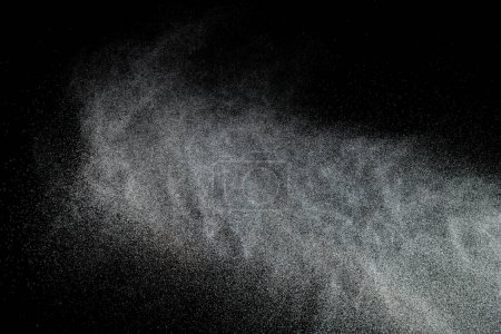 Photo for Million of Star Dust, Photo image of falling down shower rain snow, heavy snows storm flying. Freeze shot on black background isolated overlay. Spray water fog smoke as star particle on wind - Royalty Free Image