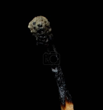 Foto de Close up after burn out match, Match fire down over black background. Concept office guy run burn out of working fire or idea inspiration - Imagen libre de derechos