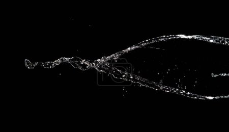 Foto de Shape form pouring of Water line fall to tube pine water in air and stop motion freeze shot. Pour Throw Water for shape line texture graphic resource elements, black background isolated - Imagen libre de derechos