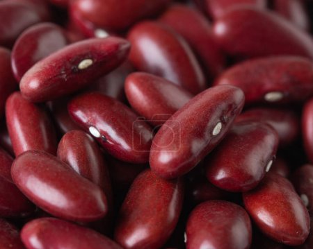 Photo for Macro Close up Texture of red bean, red grain beans. Beautiful complete seed pea bean, food object design. Selective focus freeze shot black background isolated - Royalty Free Image