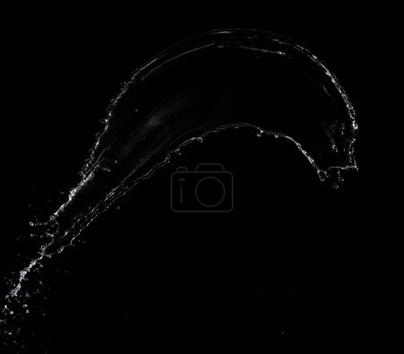 Foto de Shape form throw of Water splashes into drop water attack fluttering in air and stop motion freeze shot. Splash Water for explosion texture graphic resource elements, black background isolated - Imagen libre de derechos