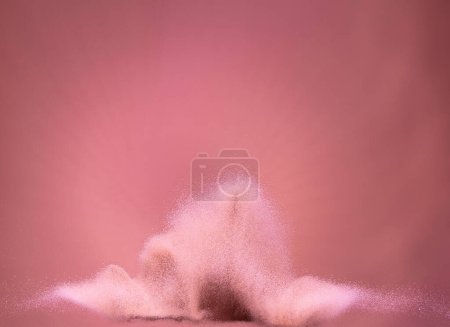 Foto de Small Fine size Sand flying explosion, Pink wave explode, abstract cloud fly. Pink Sweet colored sand splash throwing Air. Love Particle wallpaper background high speed shutter, freeze stop motion - Imagen libre de derechos