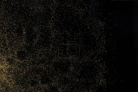 Photo for Small size yellow Sand flying explosion, gold cheese sands grain wave explode. Abstract cloud fly. Yellow colored sand splash throwing in Air. black background Isolated high speed shutter, throwing - Royalty Free Image